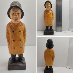 Vintage Fisherman ceramic figurine.